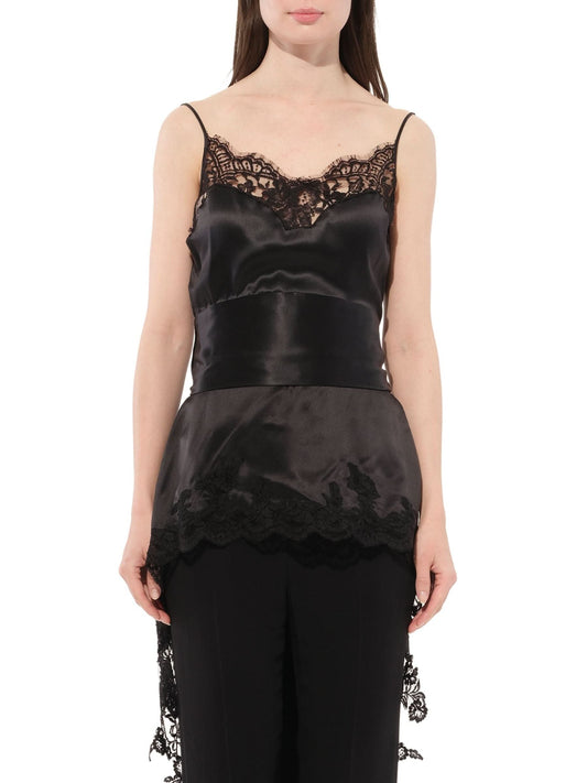 Image of a model wearing Tops. Productname: GIVENCHY Podium Top in Black colour by brand - GIVENCHY