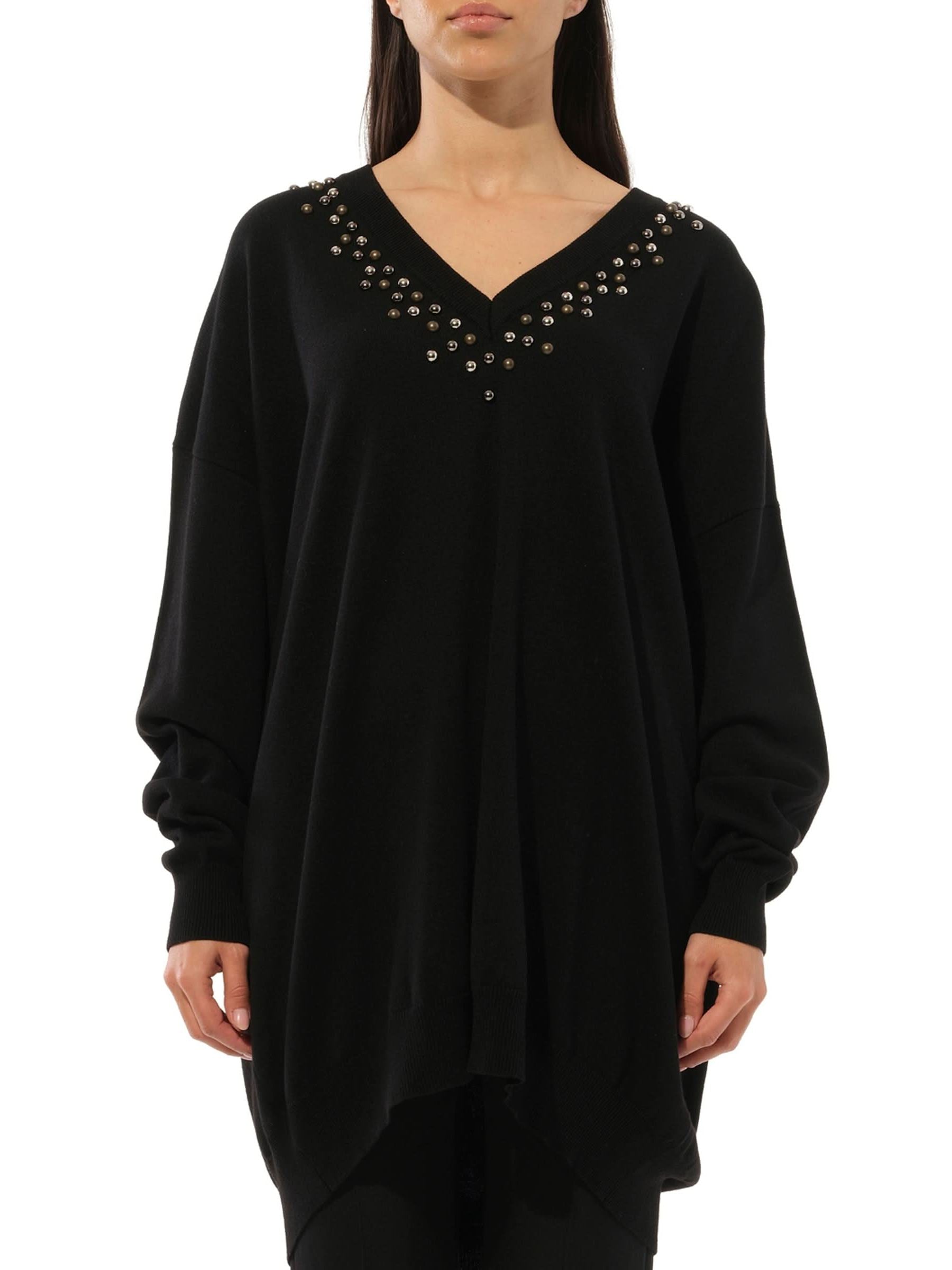 Image of a model wearing Outerwear. Product name - Pullovers Black in Black colour by brand - GIVENCHY