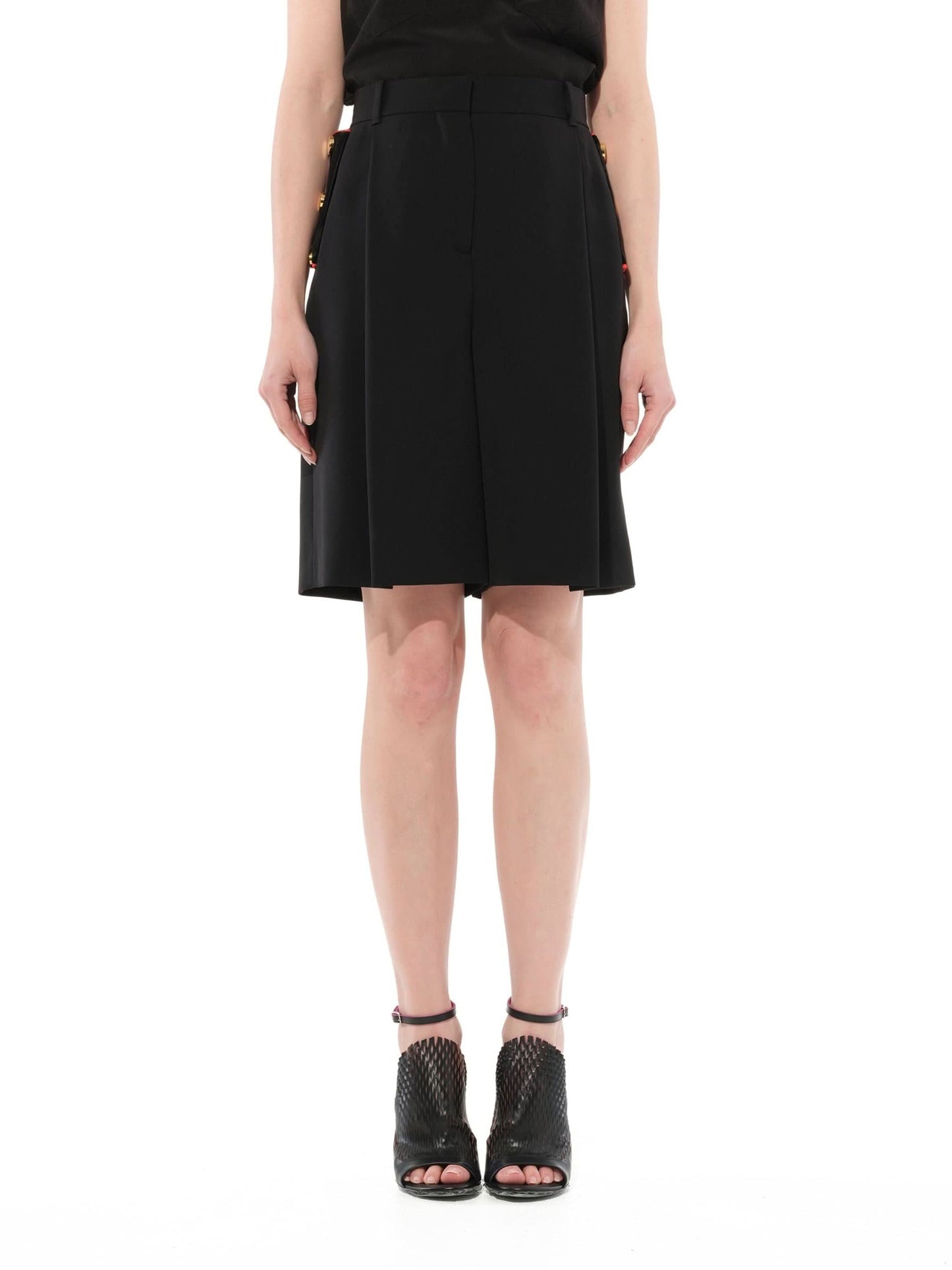 Image of a model wearing Shorts. Product name - Shorts in Black colour by brand - GIVENCHY