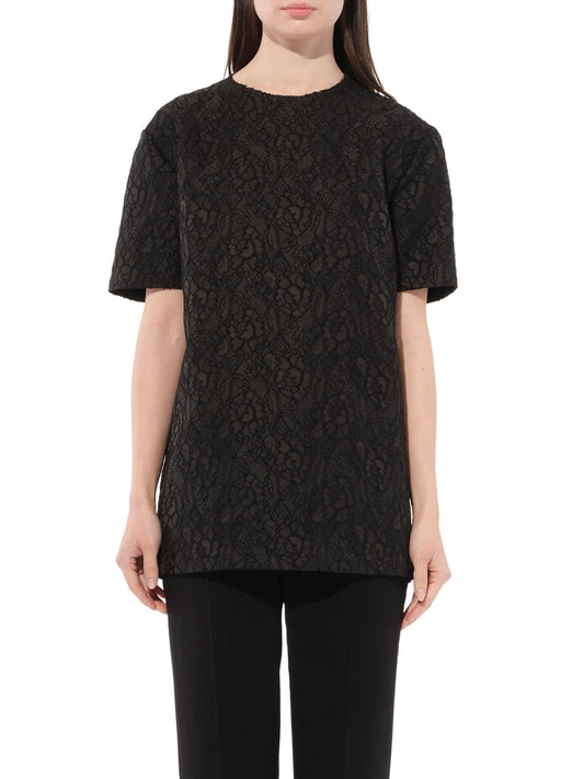 Image of a model wearing Tops. Productname: GIVENCHY Top in Black colour by brand - GIVENCHY