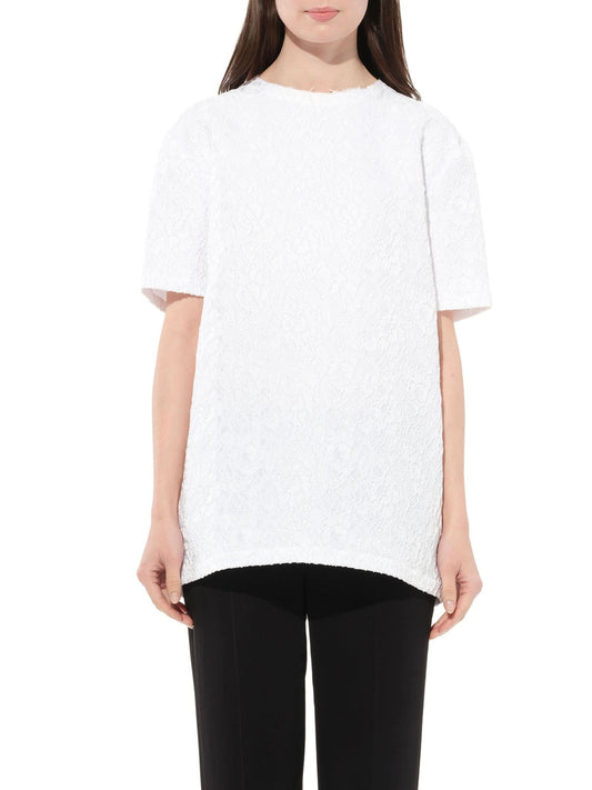 Image of a model wearing Tops. Productname: GIVENCHY Top in White colour by brand - GIVENCHY