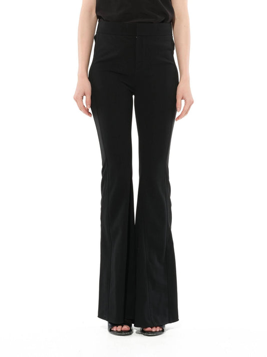 Image of a model wearing Pants. Productname: GIVENCHY Trousers in BLACK colour by brand - GIVENCHY