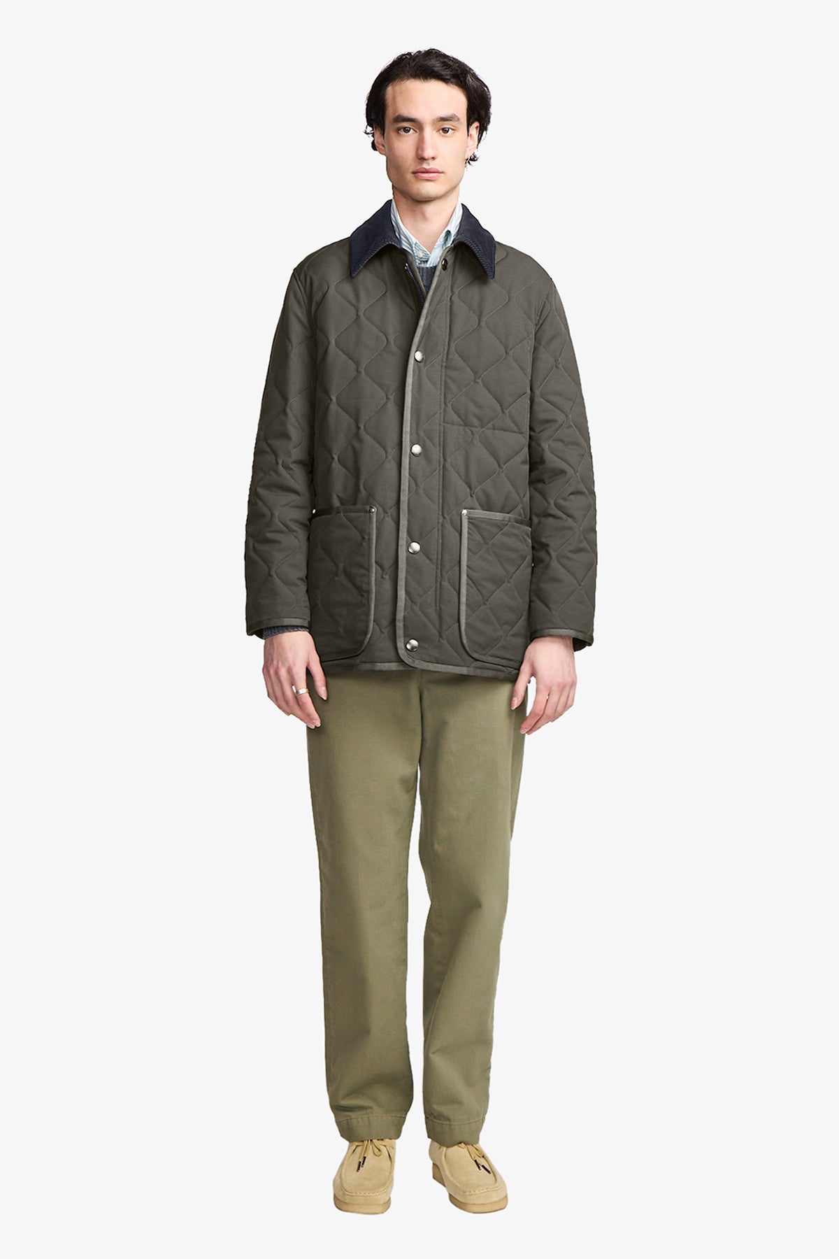 Image of a model wearing Outerwear. Productname: Anthony Squires Goodwin quilted jacket in Green colour by brand - Anthony Squires