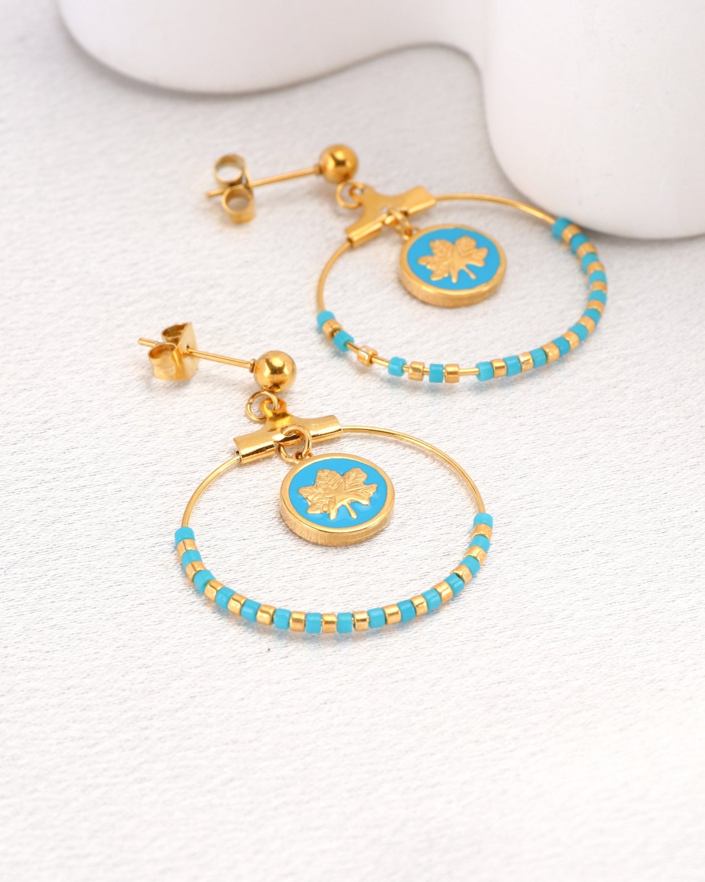 Image of Accessories. Product name - Azura Blue Gold Leaf and Bead Earrings in Blue colour by brand - Heychic