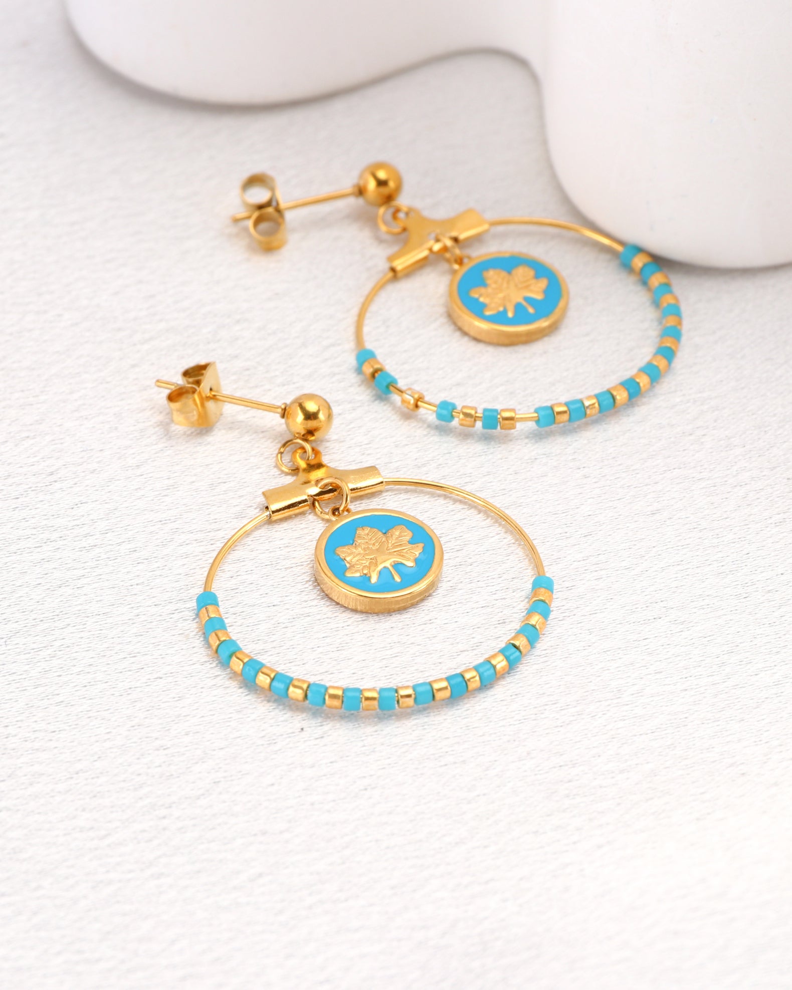 Image of Accessories. Product name - Azura Blue Gold Leaf and Bead Earrings in Blue colour by brand - Heychic