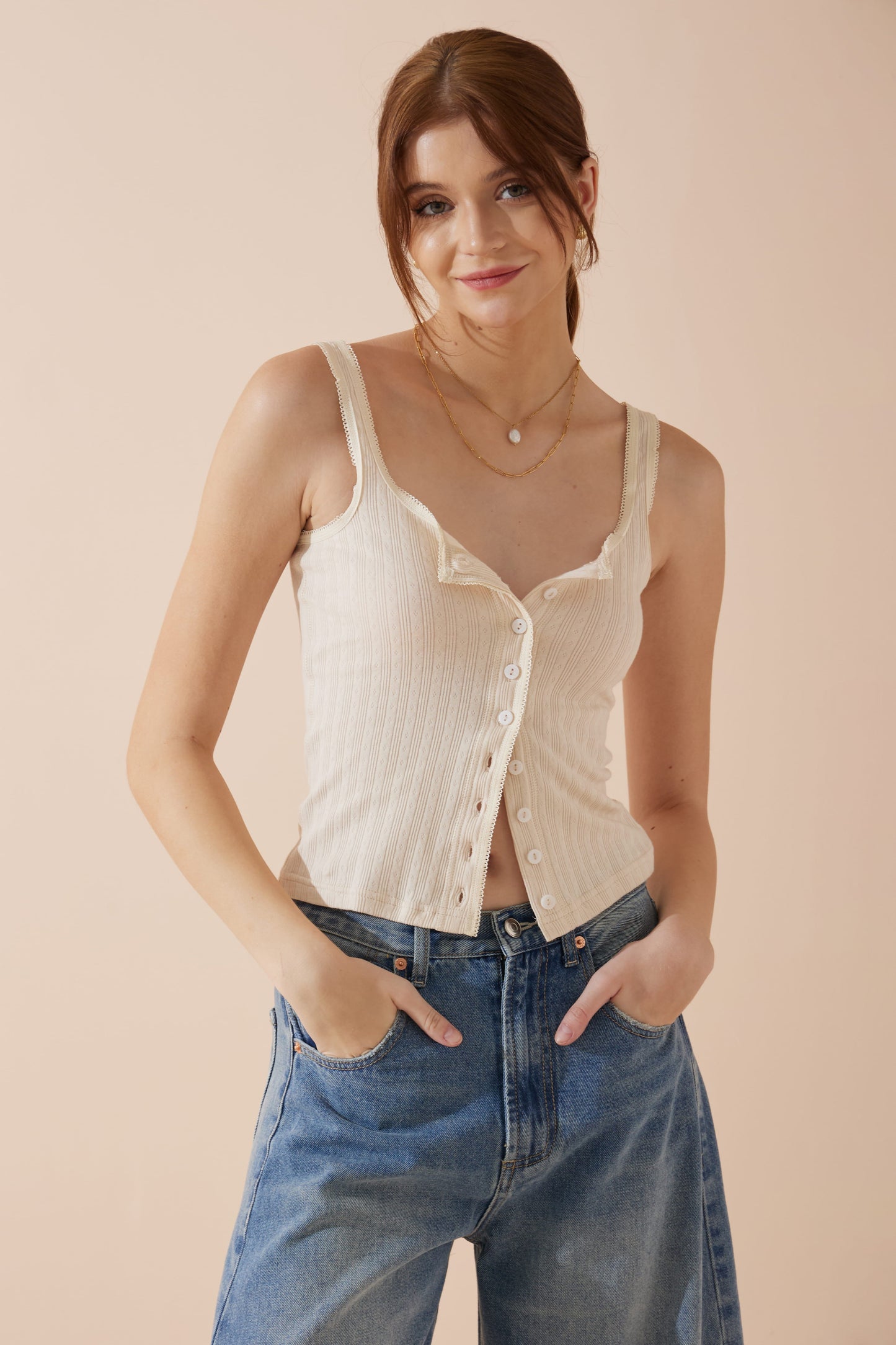 Image of a model wearing Tops. Productname: Heychic Sadie Button Tank Top in Beige colour by brand - Heychic