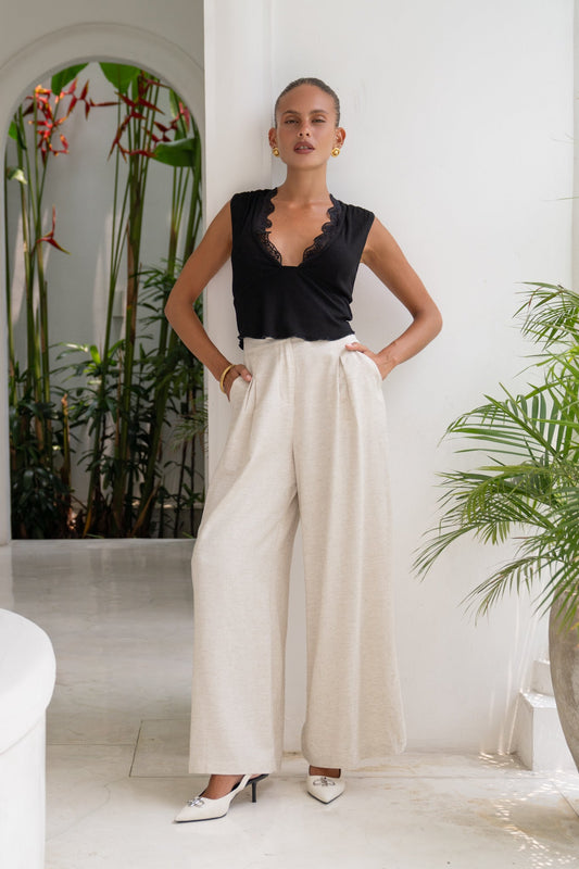 Image of a model wearing Pants. Productname: Heychic Margo Wide Leg Pants in Beige colour by brand - Heychic