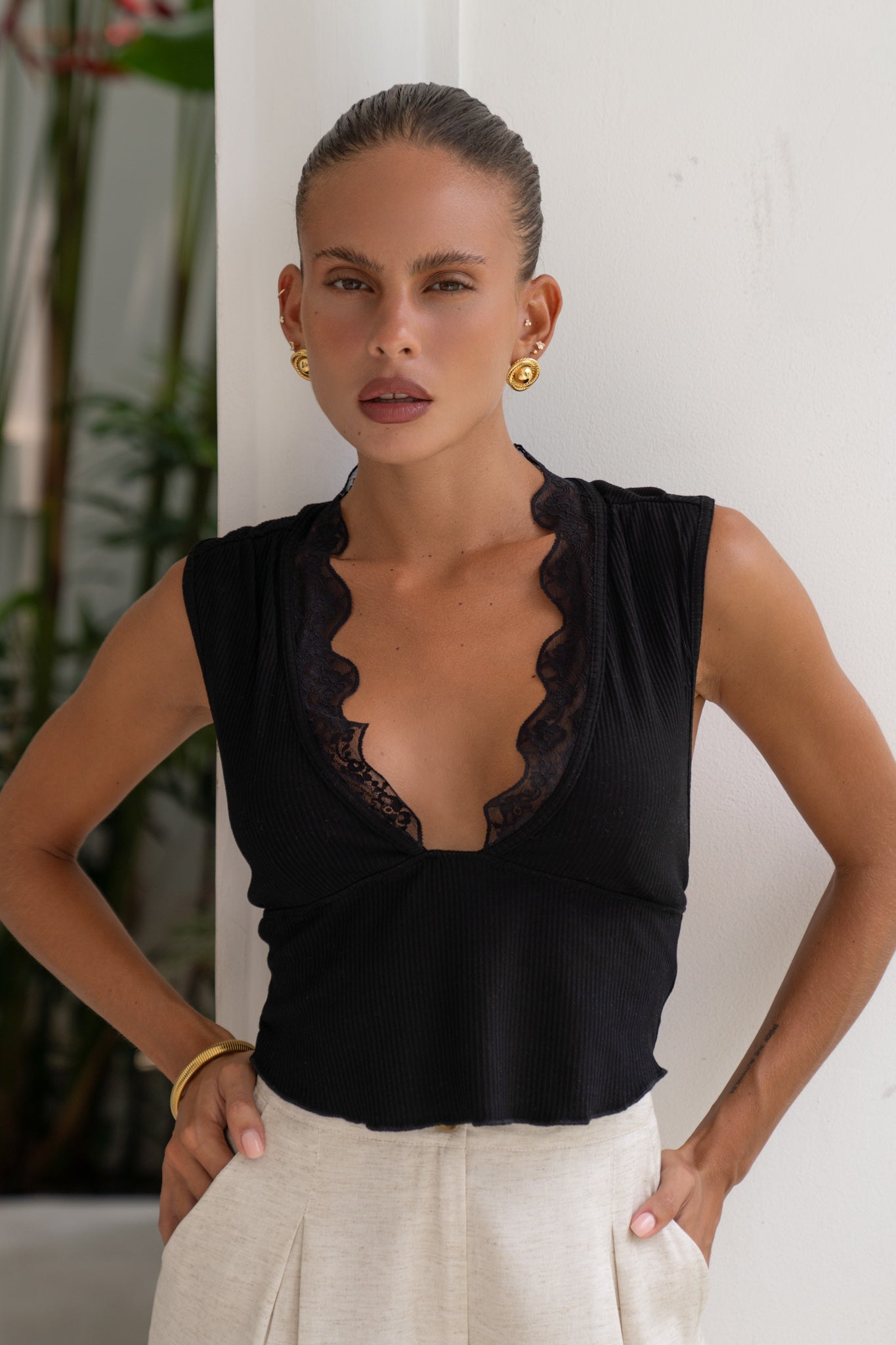 Image of a model wearing Tops. Productname: Heychic Mimi Lace Trim Top in Black colour by brand - Heychic