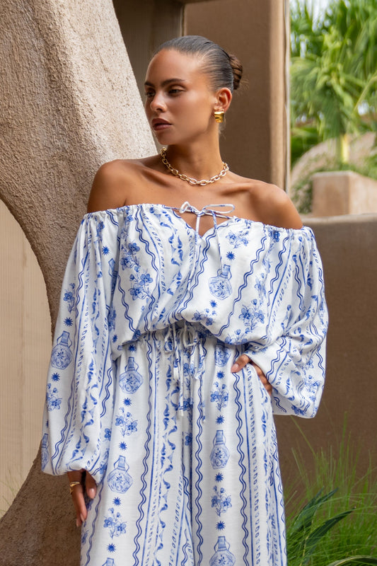 Image of a model wearing Tops. Productname: Heychic Antheia Floral Balloon Sleeve Top in Blue colour by brand - Heychic
