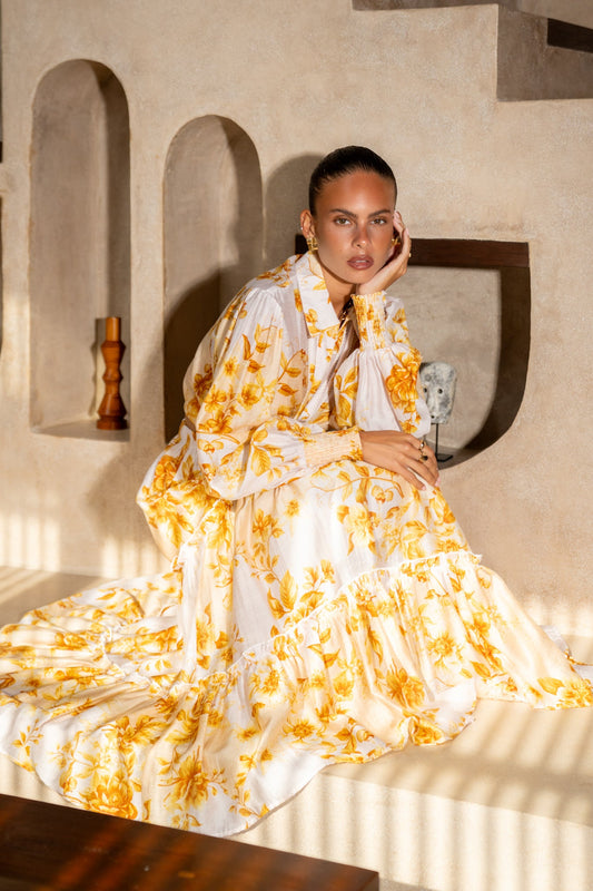 Image of a model wearing Skirts. Productname: Fiorella Yellow Floral Maxi Skirt in Floral colour by brand - Heychic