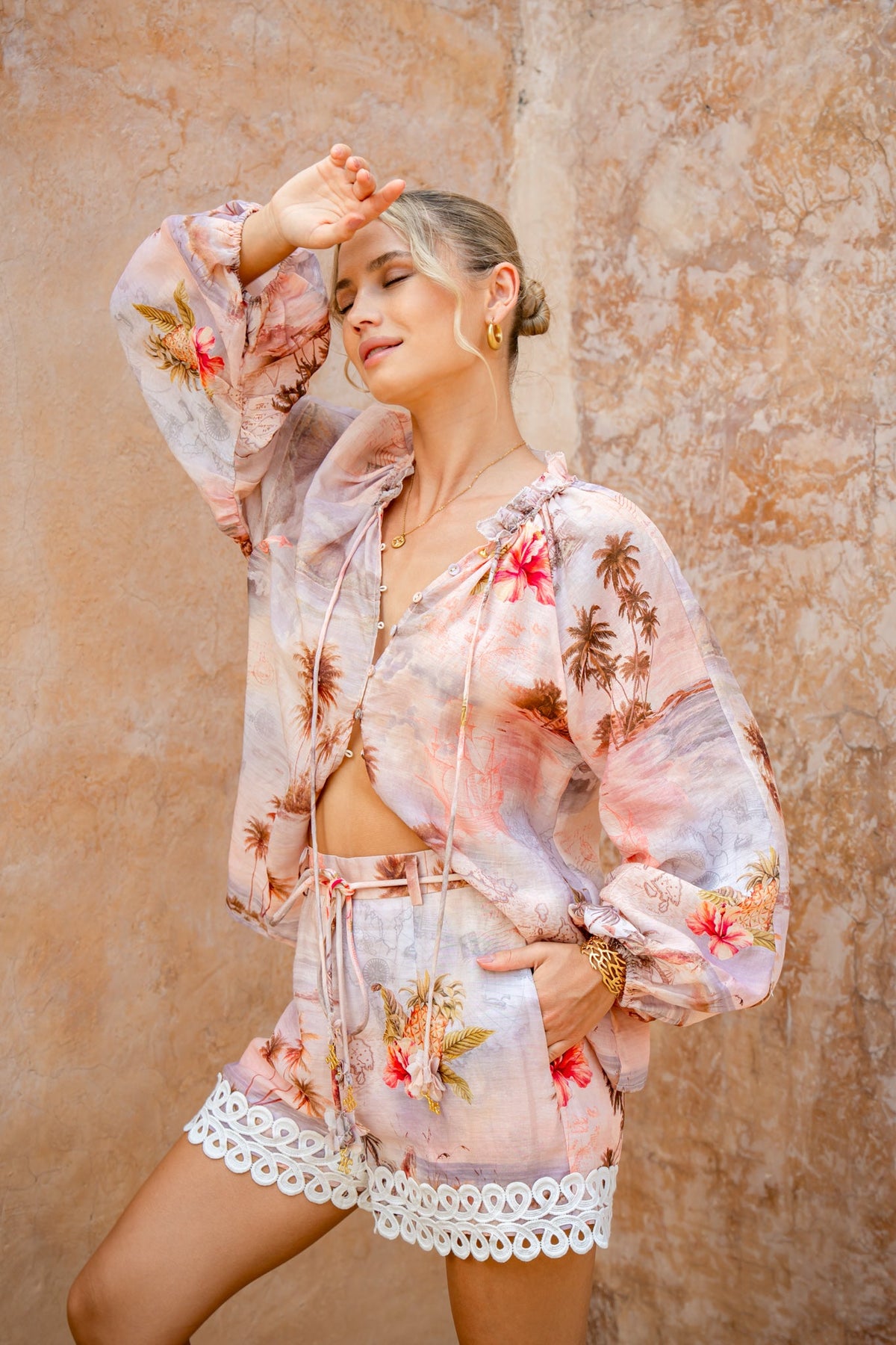 Image of a model wearing Tops. Product name - Horizon Pink Tropical Blouse in Pink colour by brand - HEYCHIC