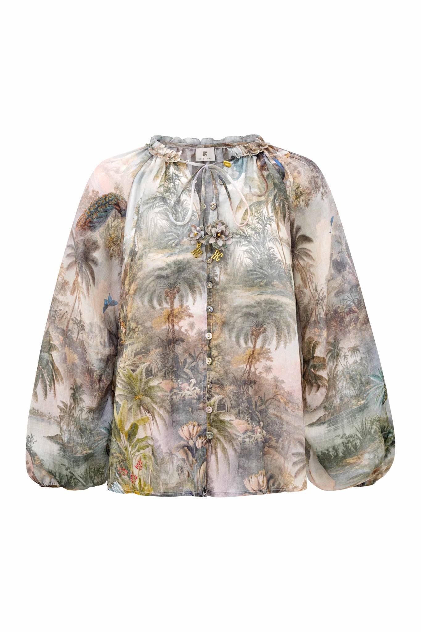 Image of a model wearing Tops. Product name - Paradise Green Tropical Blouse in Green colour by brand - HEYCHIC