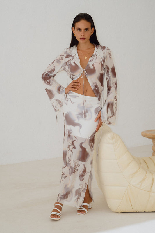 Image of a model wearing Tops. Productname: Heychic Aria Brown Abstract Marble Mesh Tie Top in Brown colour by brand - Heychic