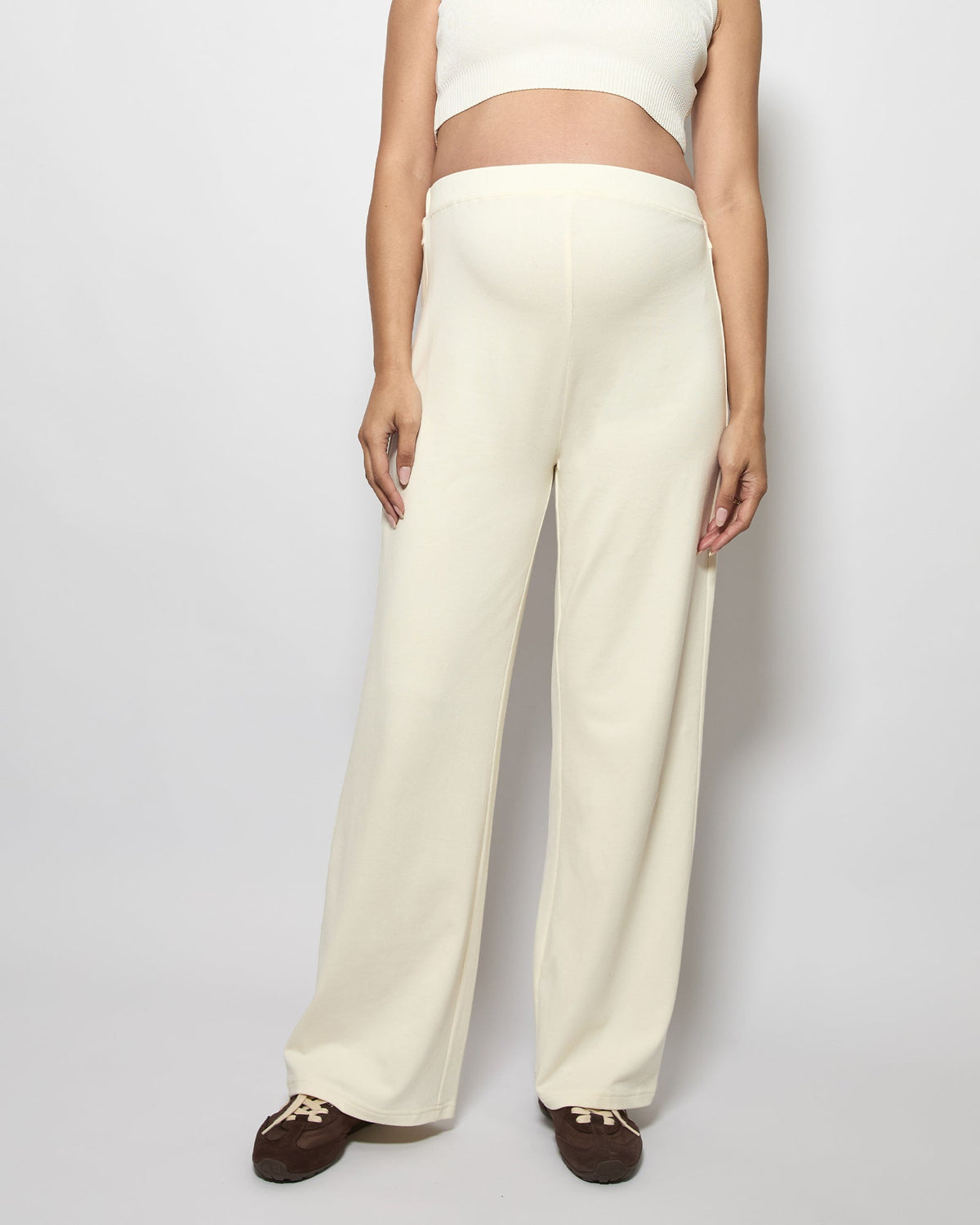 Image of a model wearing Pants. Product name - Harriette Wide Cotton Pants in colour by brand - Soon Maternity