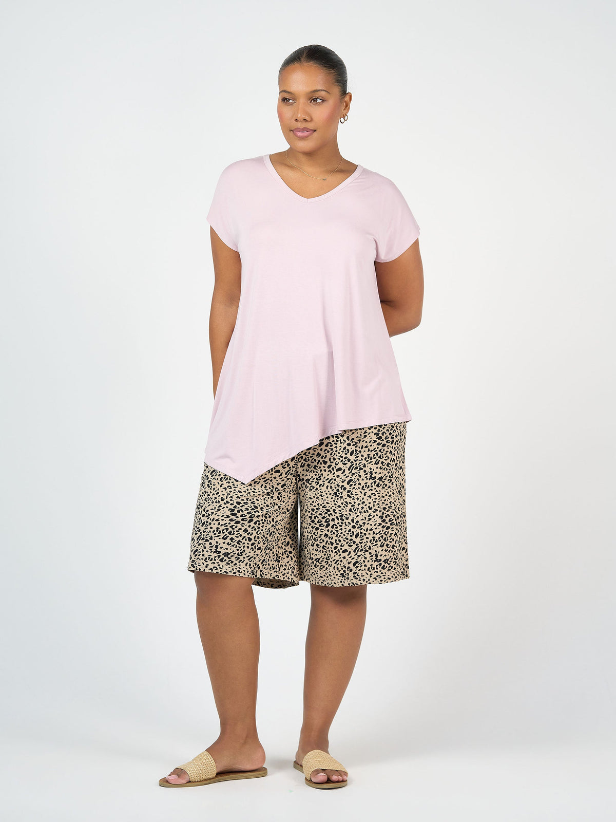 Image of a model wearing Shorts. Product name - Simone Wide Leg Bamboo Shorts Brown Leopard in Brown Leopard colour by brand - Lou Lou