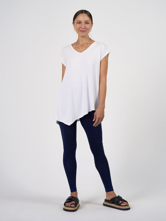 Image of a model wearing Pants. Product name - Luxe Bamboo Full-Length Legging Navy in Navy colour by brand - Lou Lou