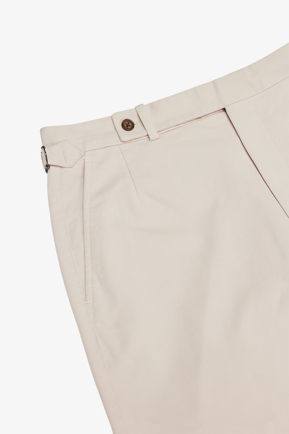 Image of a model wearing Shorts. Product name - Orson Stone Shorts in Stone colour by brand - Anthony Squires