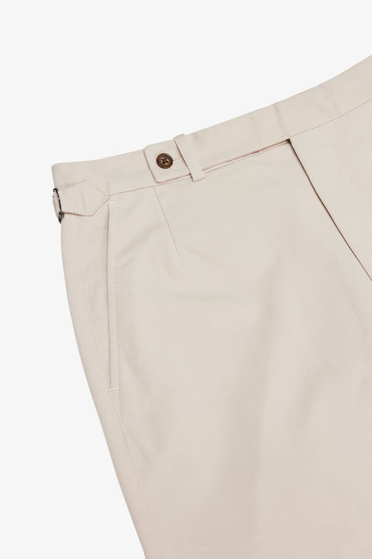 Image of a model wearing Shorts. Product name - Orson Stone Shorts in Stone colour by brand - Anthony Squires