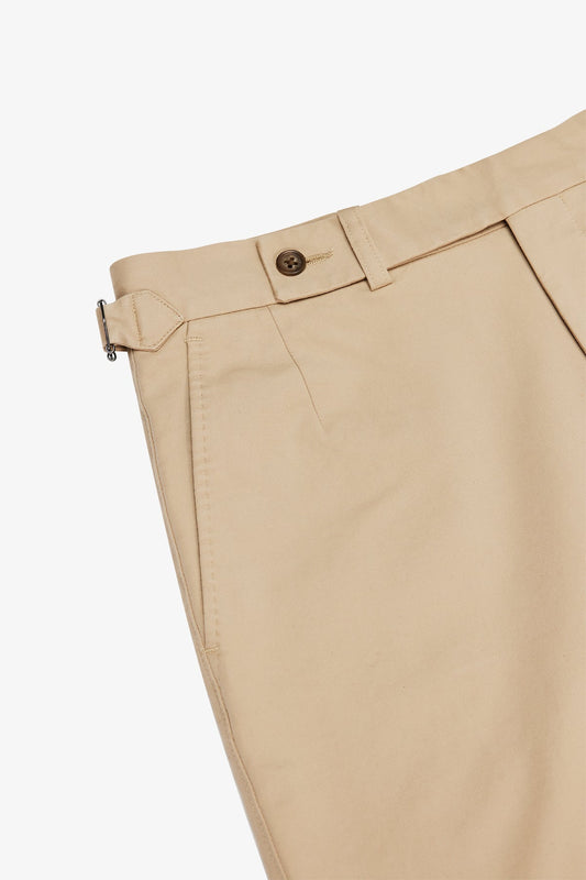 Image of a model wearing Shorts. Productname: Orson Beige Shorts in Beige colour by brand - Anthony Squires