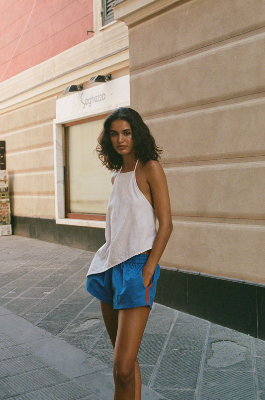 Image of a model wearing Shorts. Product name - Romeo Shorts in Blue colour by brand - With Jéan