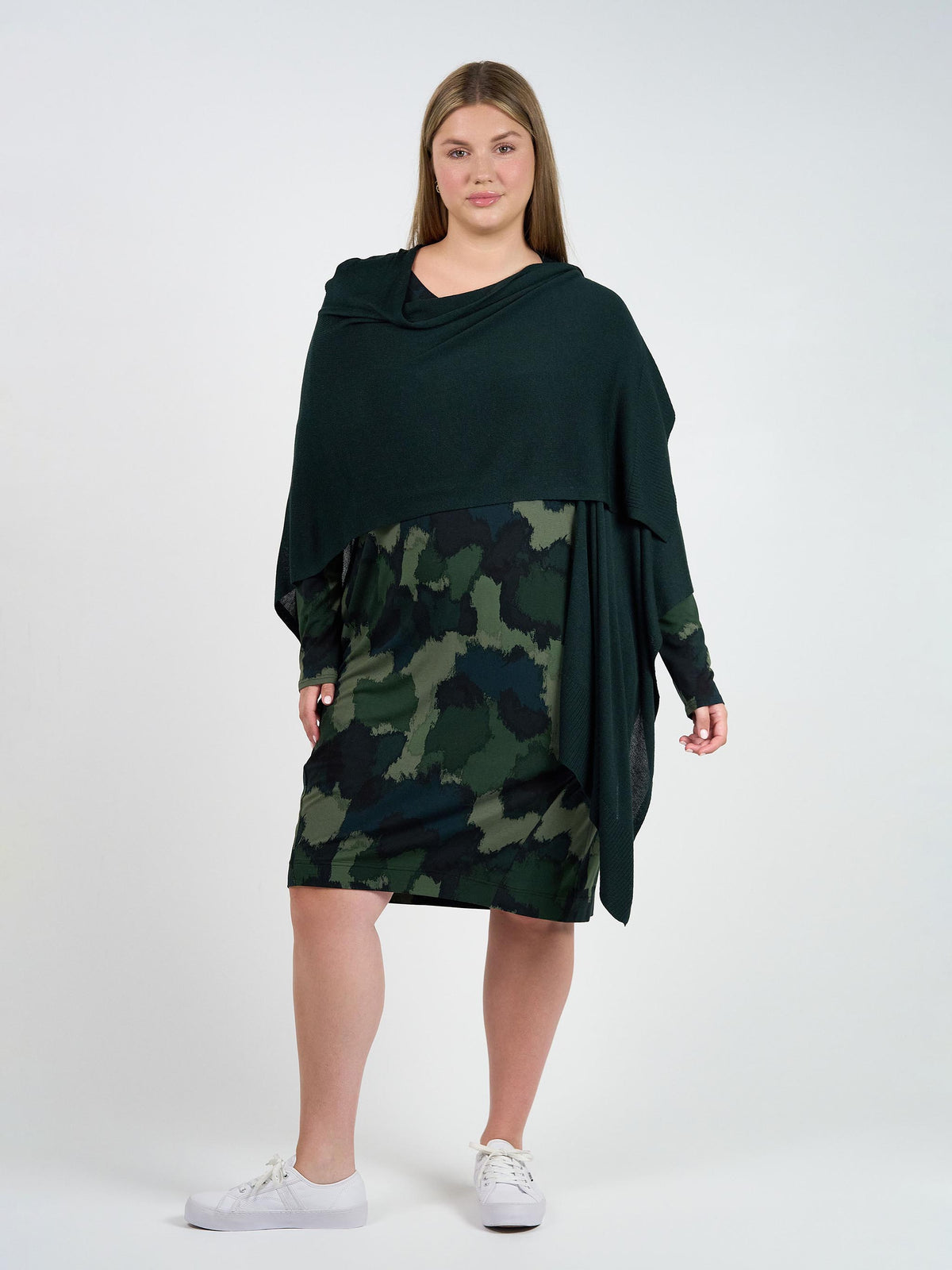 Image of a model wearing Tops. Product name - Supreme Cashmere/Bamboo Travel Wrap Dark Green in Dark Green colour by brand - Lou Lou