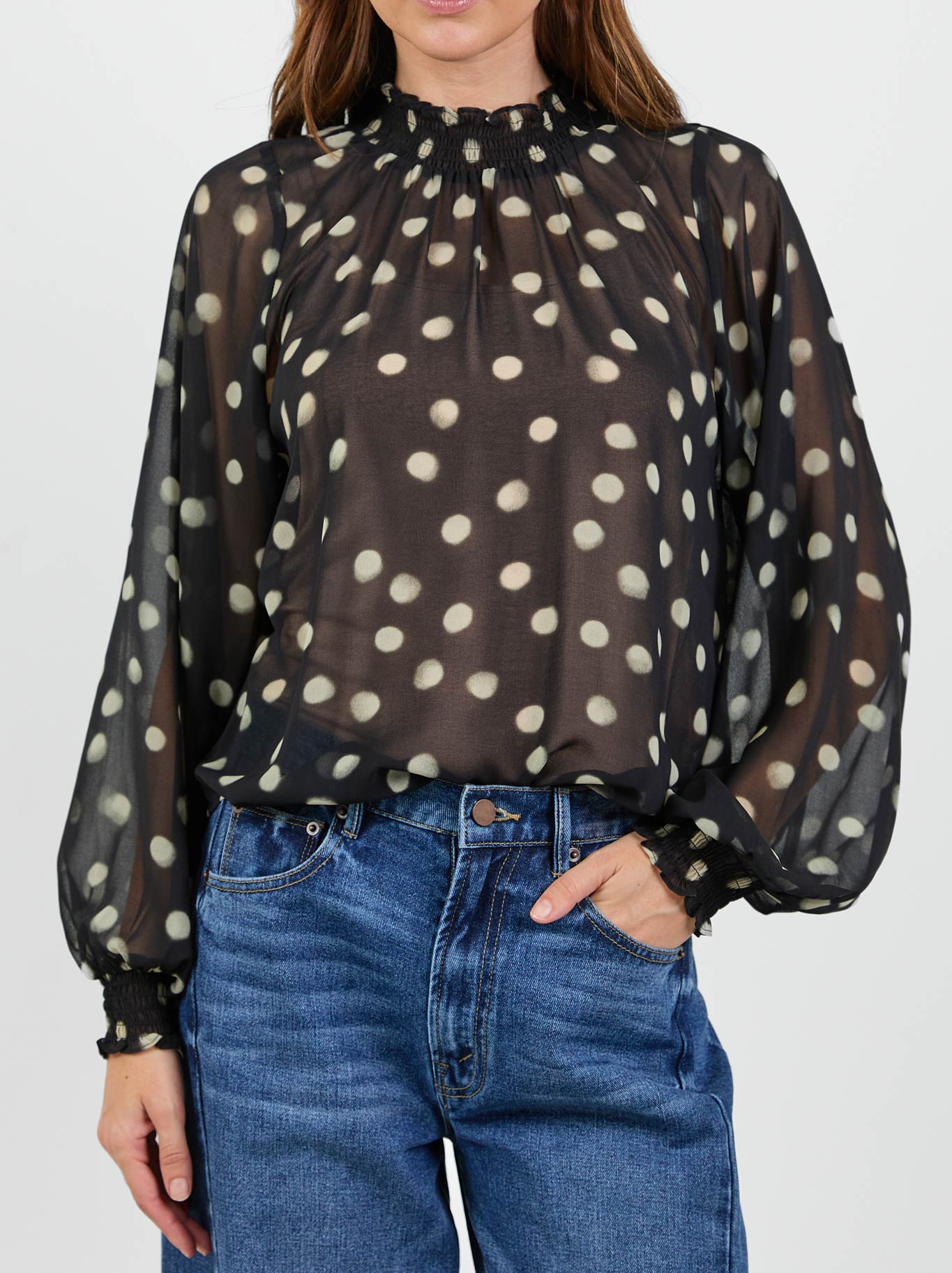 Image of a model wearing Tops. Product name - IVY & JACK EMPHATIC GEORGETTE TOP in Polka Dot colour by brand - Ivy & Jack