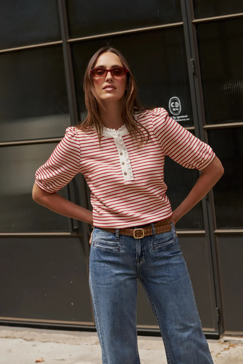 Image of a model wearing Tops. Product name - Jacqueline Top Red/White Stripe in Red/White Stripe colour by brand - Kireina