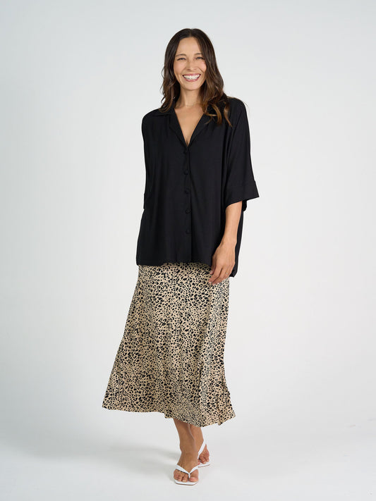 Image of a model wearing Skirts. Product name - Jackson Bamboo Maxi Skirt Brown Leopard in Brown Leopard colour by brand - Lou Lou
