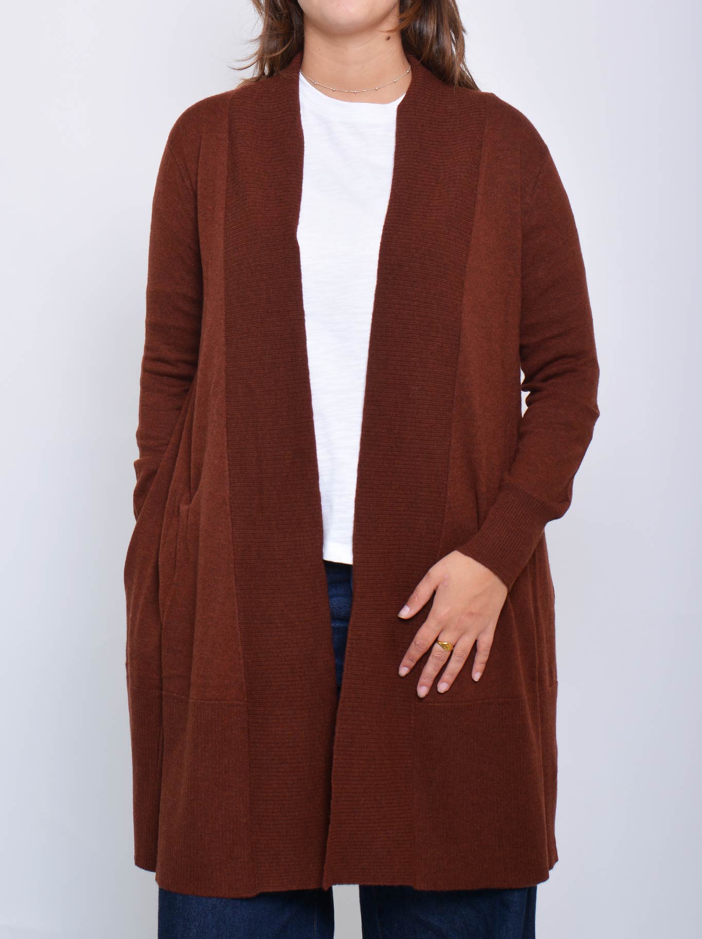 Image of a model wearing Outerwear. Product name - James Melbourne Caspian Cardigan in Nutmeg colour by brand - James Melbourne