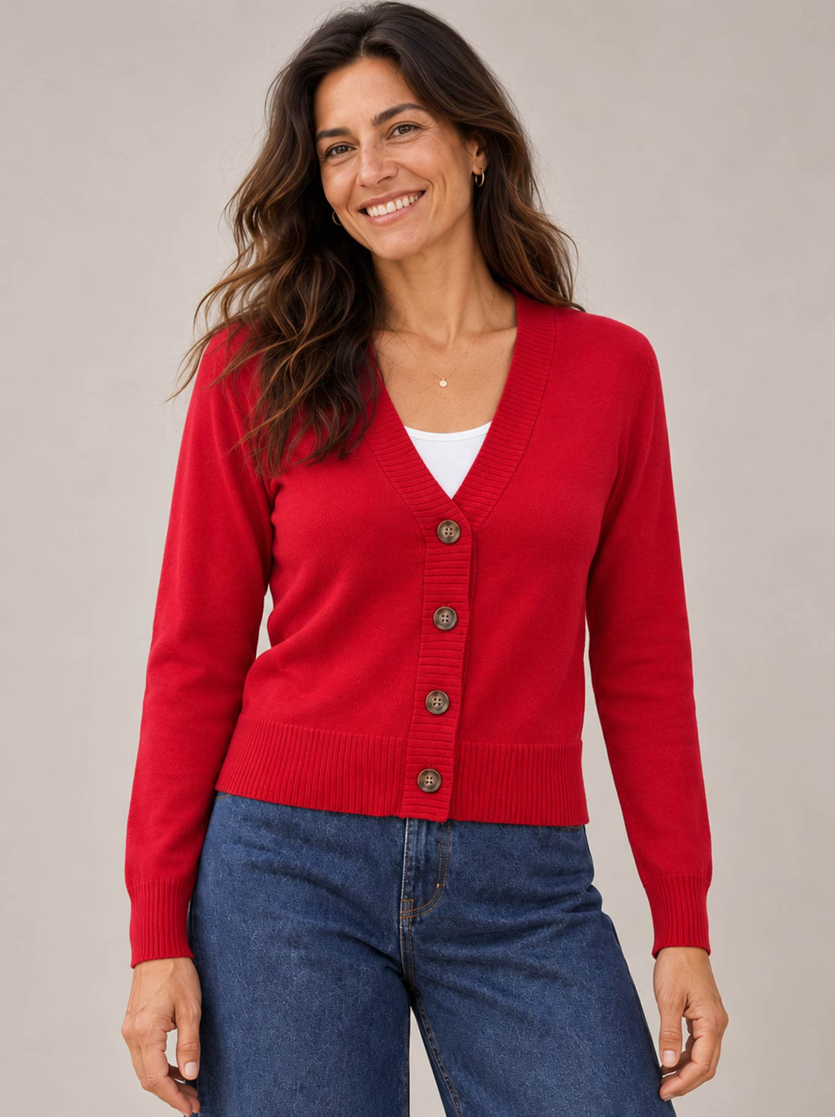 Image of a model wearing Outerwear. Product name - James Melbourne V Button Cardi in Red colour by brand - James Melbourne