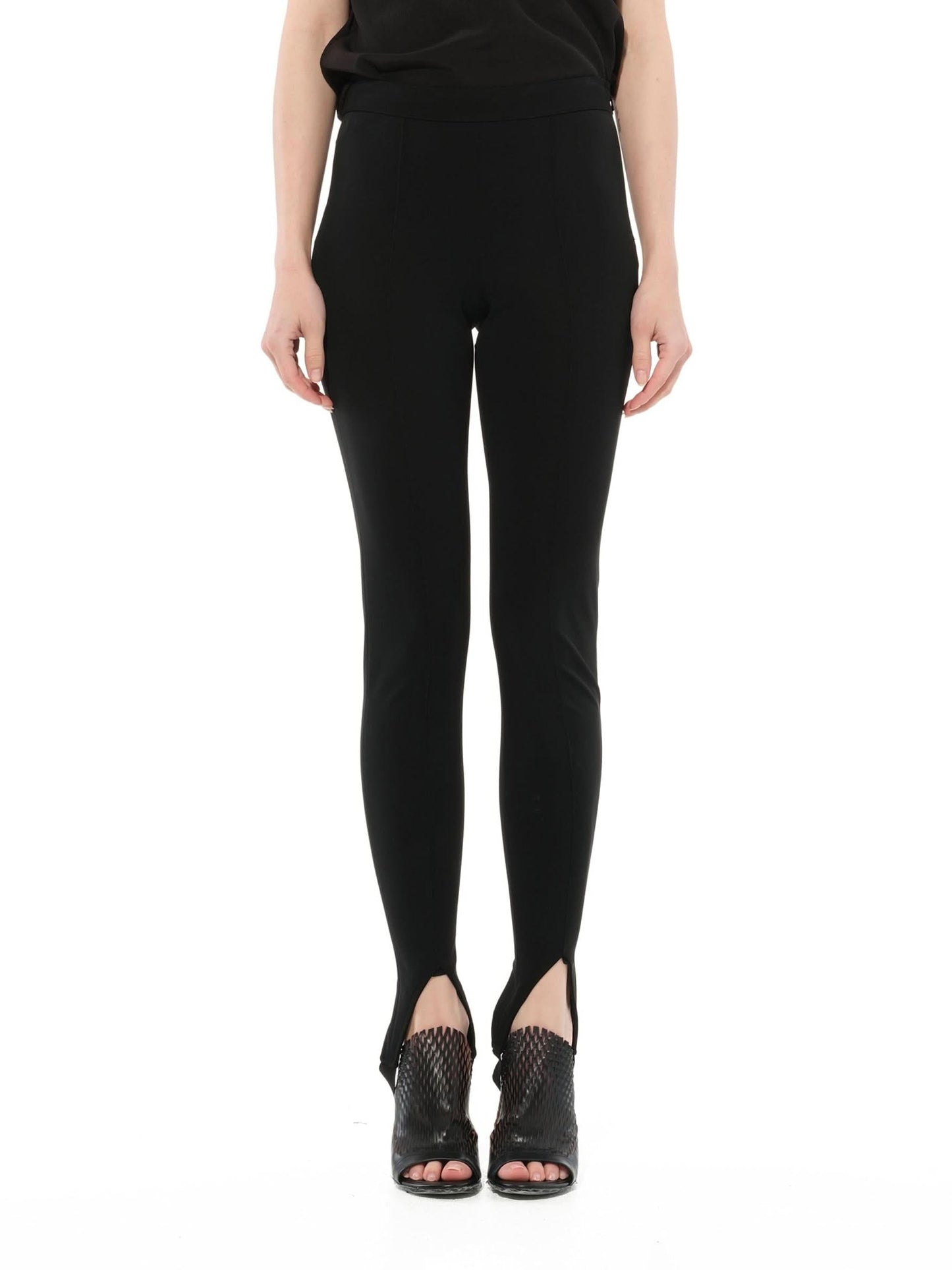 Image of a model wearing Pants. Productname: GIVENCHY Jersey Leggings in Black colour by brand - GIVENCHY