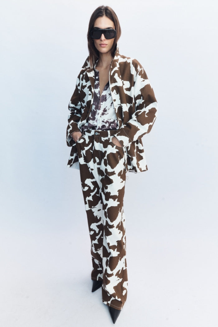 Image of a model wearing Pants. Product name - Jessie Jeans Brown in Brown colour by brand - Blanca Studio