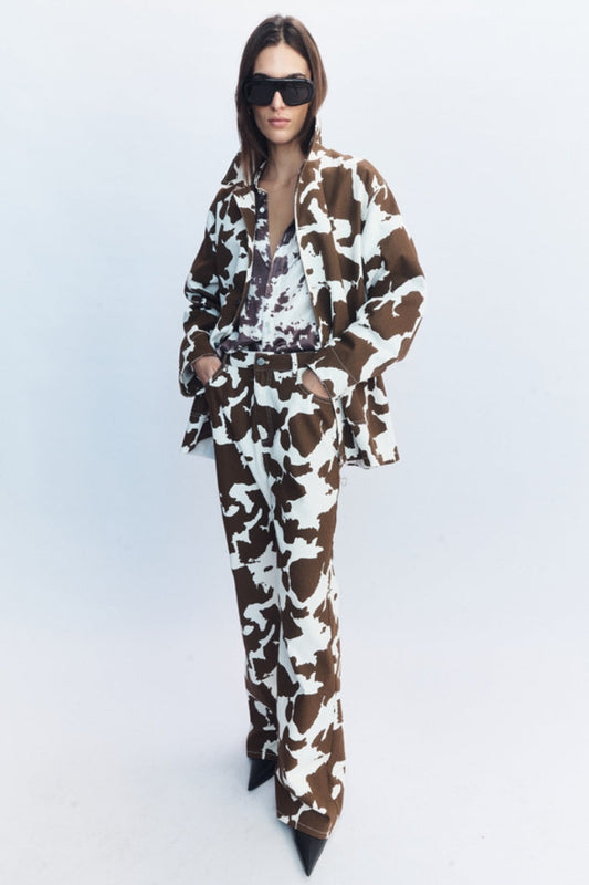 Image of a model wearing Pants. Product name - Jessie Jeans Brown in Brown colour by brand - Blanca Studio
