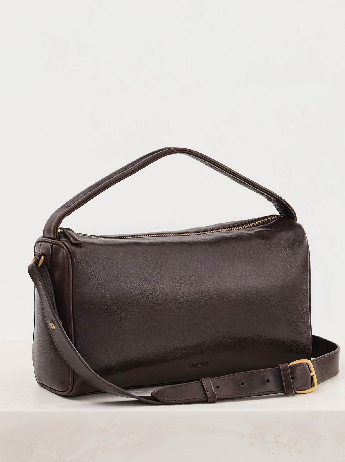 Image of Bags. Product name - Juju & Co Bolster Bag in Mahogony colour by brand - Juju & Co.