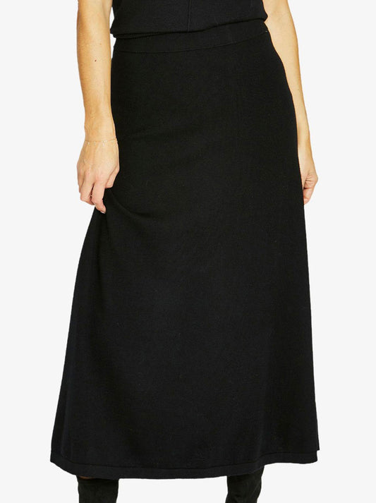 Image of a model wearing Skirts. Productname: JUMP A LINE KNIT SKIRT in Black colour by brand - Jump