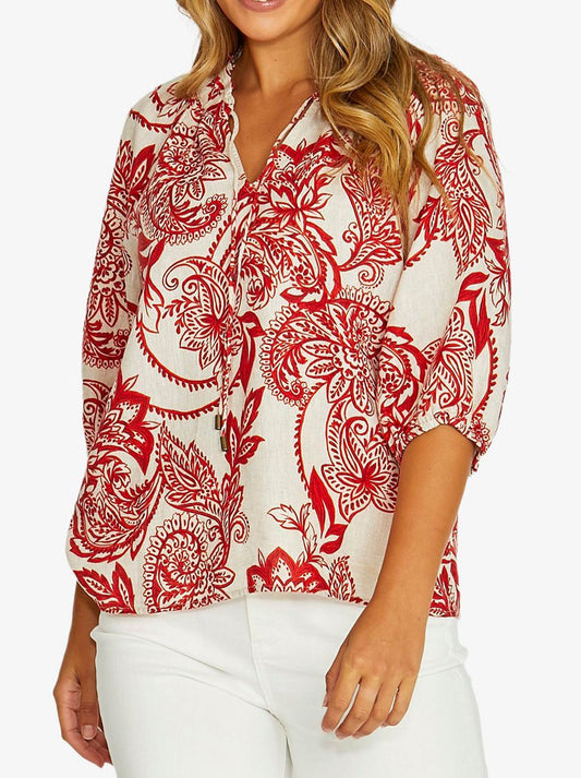 Image of a model wearing Tops. Product name - Jump Bohemia Ruffle Neck Top in Red colour by brand - Jump