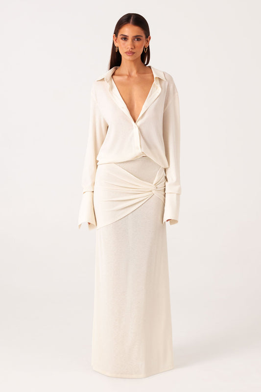 Image of a model wearing Skirts. Productname: SNDYS KALEA MAXI SKIRT in Off White colour by brand - SNDYS