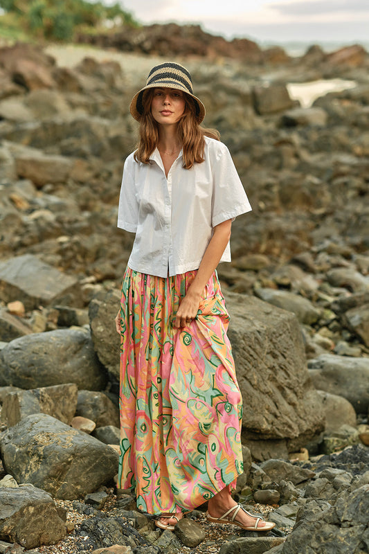 Image of a model wearing Skirts. Productname: Rubyyaya Upstream Skirt Print in Print colour by brand - Rubyyaya