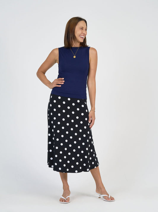 Image of a model wearing Tops. Product name - Kate Bamboo Tank Navy in Navy colour by brand - Lou Lou