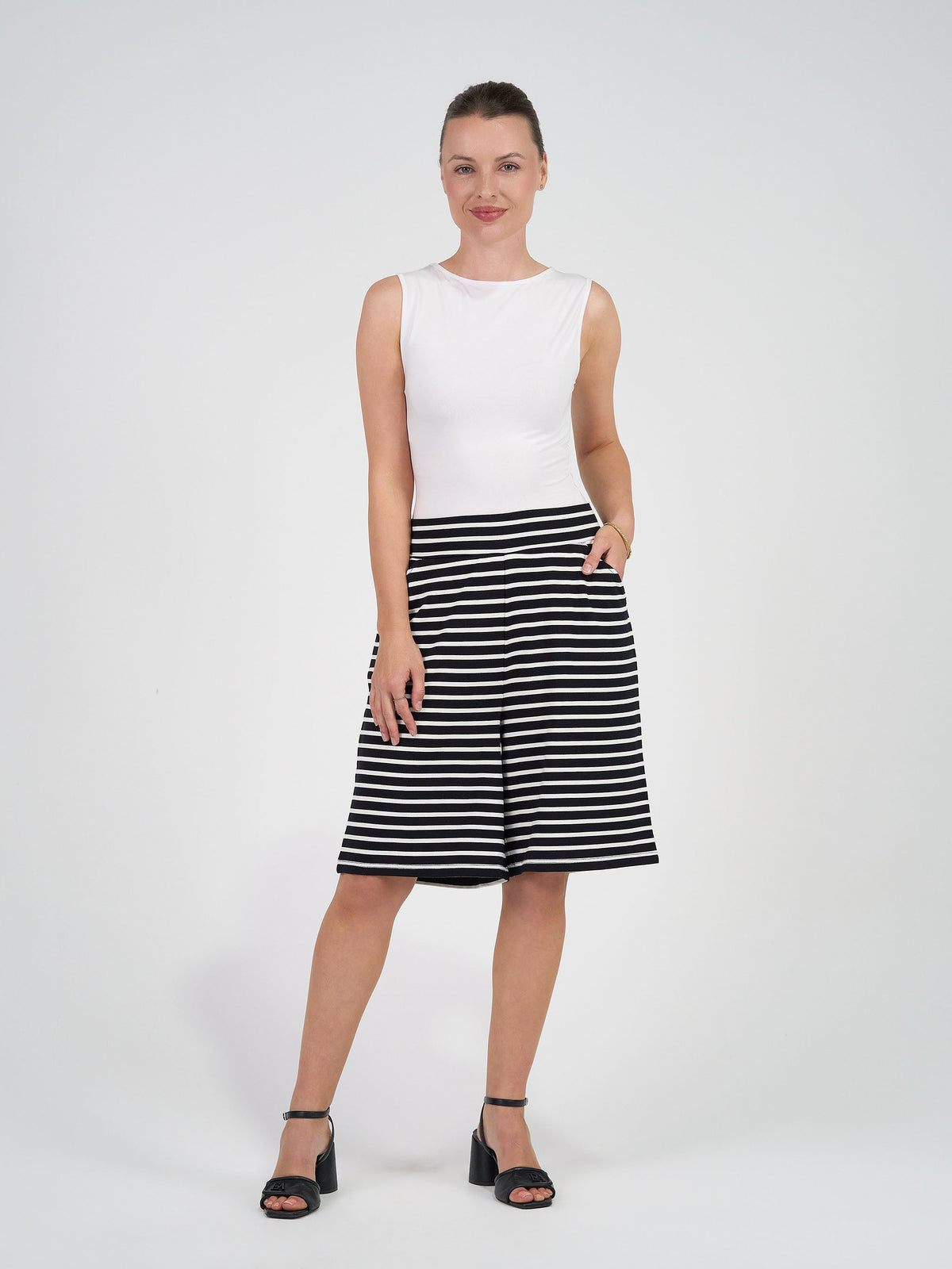 Image of a model wearing Shorts. Product name - Simone Wide Leg Bamboo Shorts Black & White Stripe in Black & White Stripe colour by brand - Lou Lou