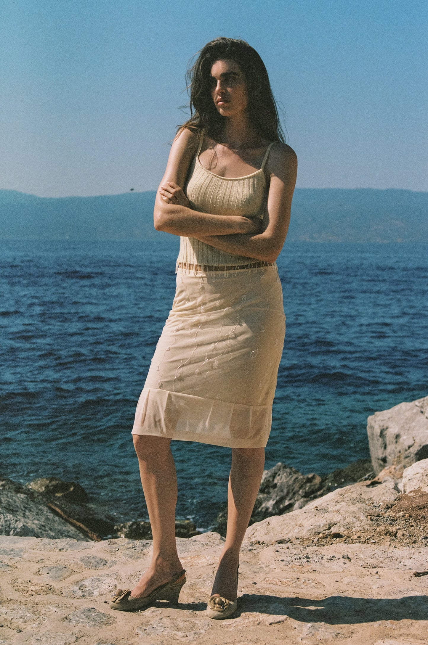 Image of a model wearing Skirts. Product name - Kayla Skirt in Champagne colour by brand - With Jéan