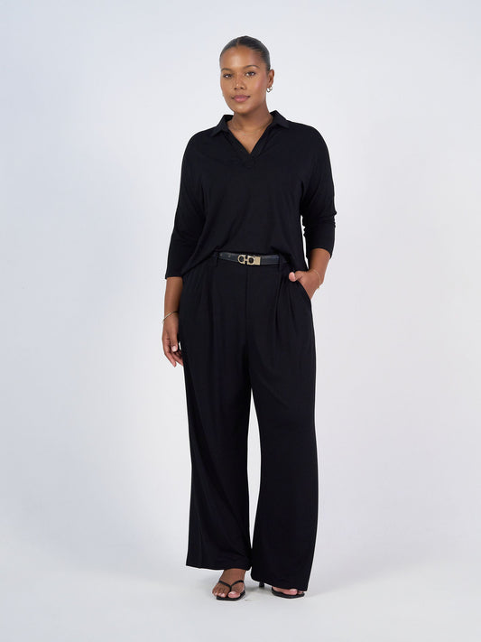 Image of a model wearing Tops. Product name - The Polo Set in Default Title colour by brand - Lou Lou