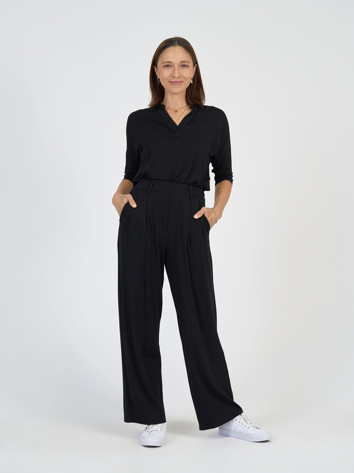 Image of a model wearing Tops. Product name - The Day Shift Set in Default Title colour by brand - Lou Lou