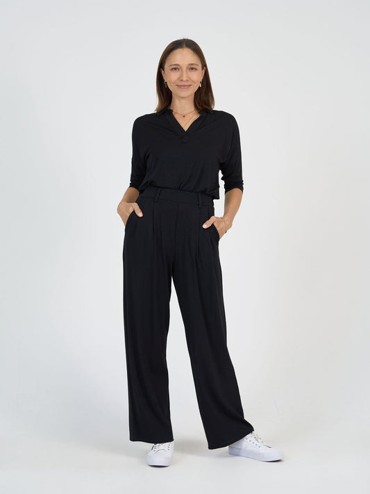 Image of a model wearing Tops. Product name - The Day Shift Set in Default Title colour by brand - Lou Lou