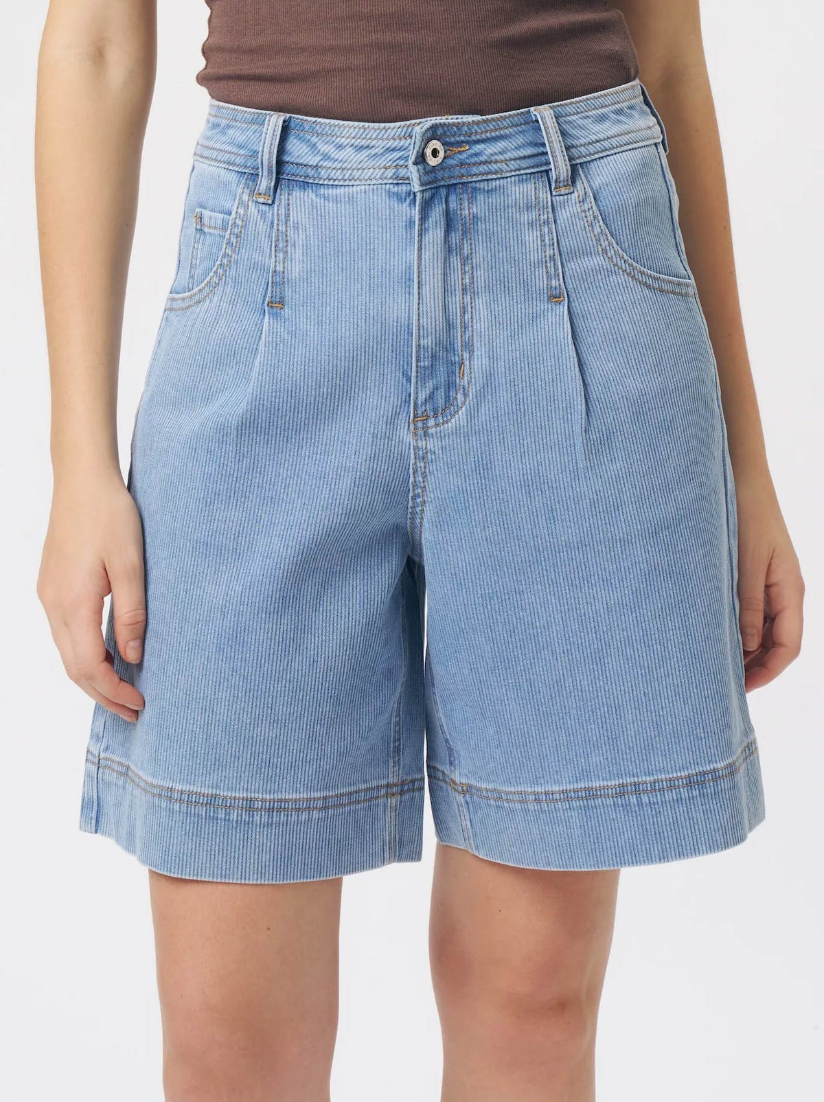 Image of a model wearing Shorts. Product name - KIREINA BIJOU SHORT in Light Blue colour by brand - Kireina