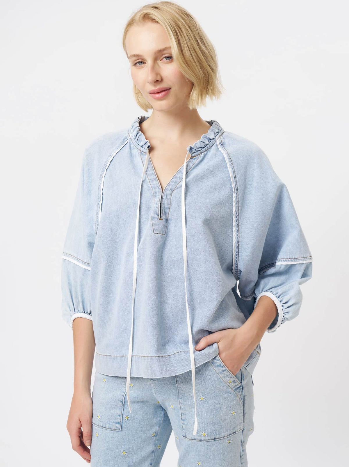 Image of a model wearing Tops. Product name - Kireina Joanne Shirt in Blue colour by brand - Kireina