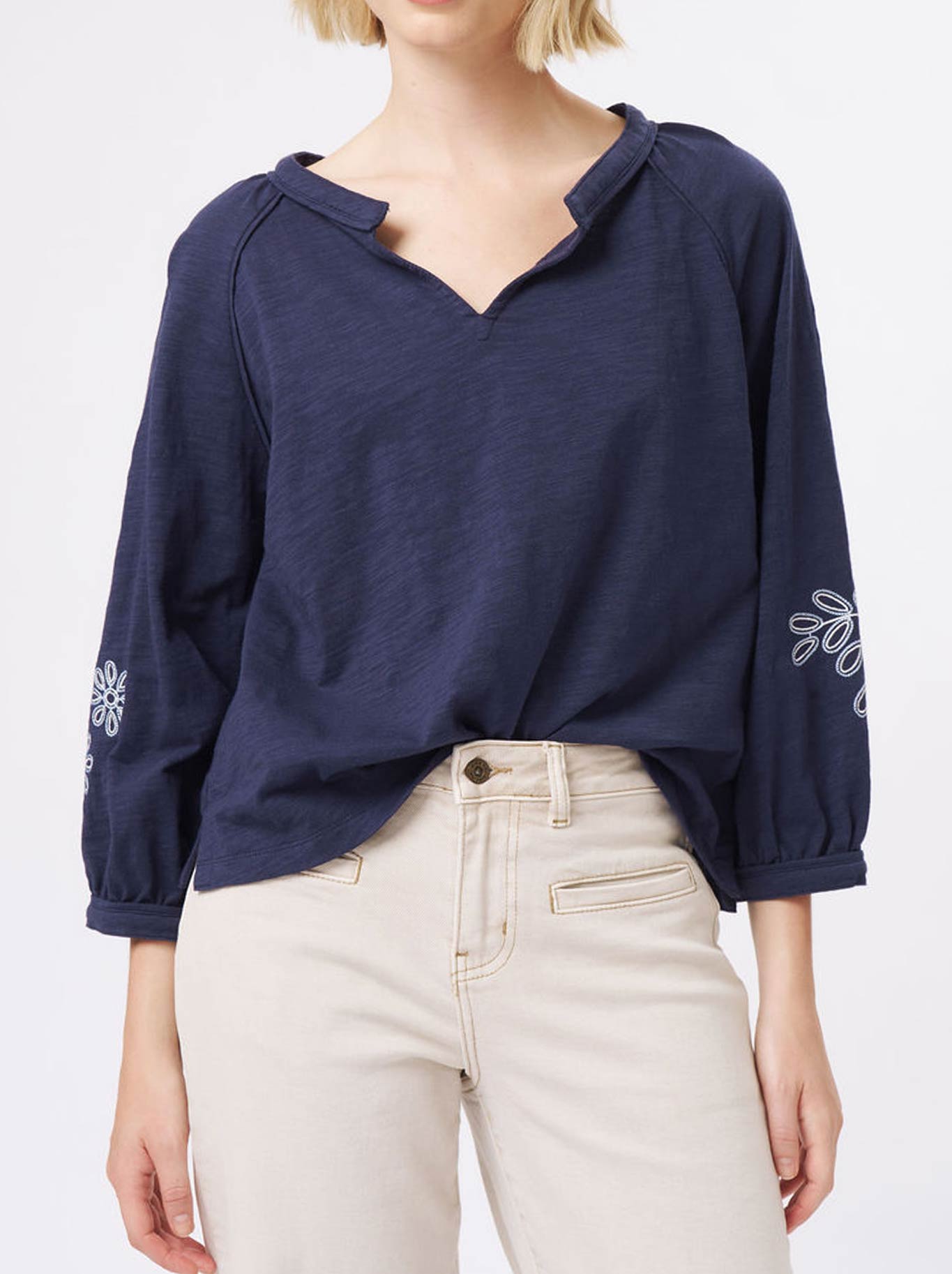 Image of a model wearing Tops. Product name - Kireina Kimberley Top in Shadow Blue colour by brand - Kireina