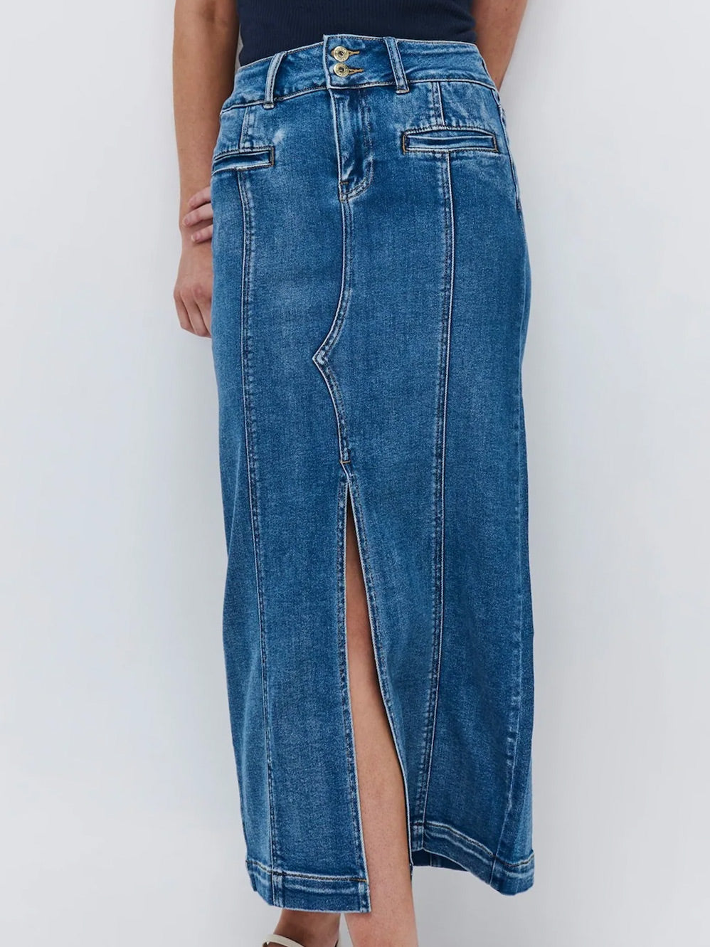 Image of a model wearing Skirts. Product name - Kireina Kendra Skirt in Austin colour by brand - Kireina