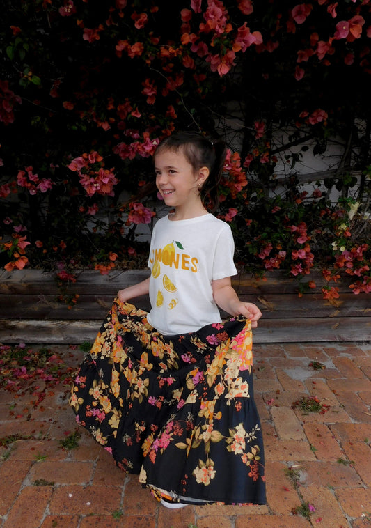 Image of a model wearing Skirts. Productname: Little Auguste Little Miss Maxi Skirt in Print colour by brand - Little Auguste