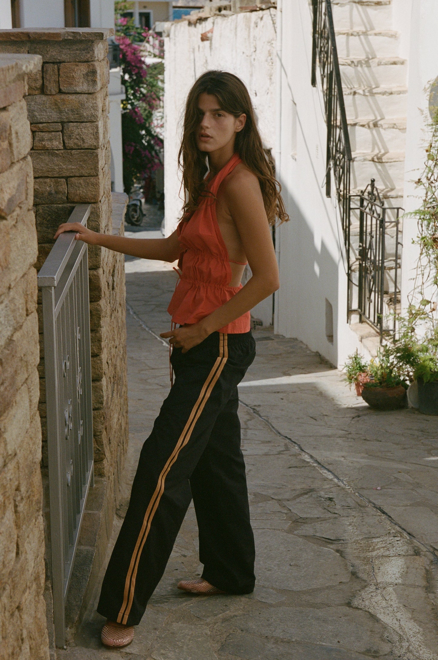 Image of a model wearing Pants. Product name - Romeo Track Pant in Black colour by brand - With Jéan